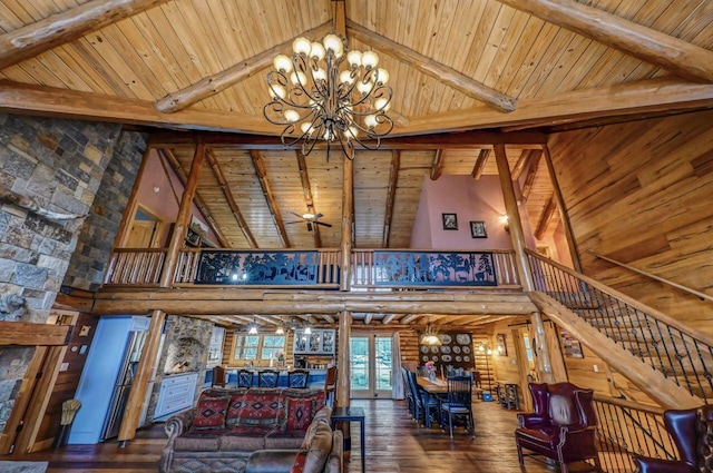 living room featuring high vaulted ceiling, an inviting chandelier, wooden ceiling, beam ceiling, and hardwood / wood-style flooring