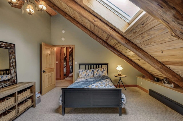 carpeted bedroom with lofted ceiling with skylight and wood ceiling