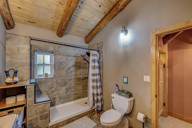 full bathroom with beamed ceiling, tiled shower, toilet, wood ceiling, and baseboards