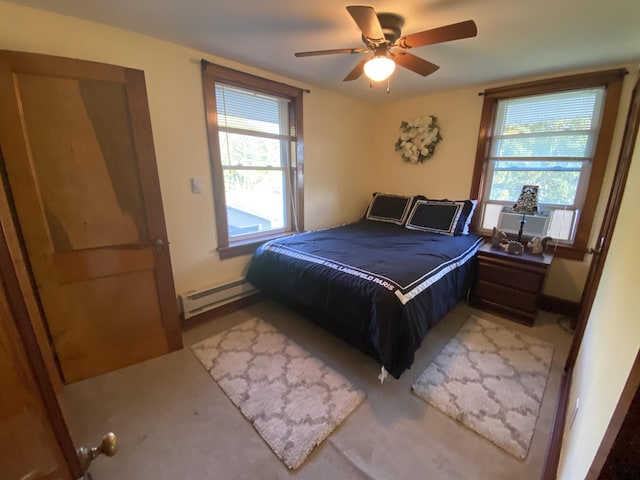 244 Learn Rd, Tannersville, PA 18372 - bedroom featuring a baseboard radiator, a ceiling fan, cooling unit, and light colored carpet