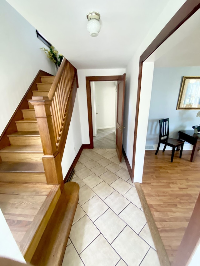 244 Learn Rd, Tannersville, PA 18372 - staircase with tile patterned flooring and baseboards