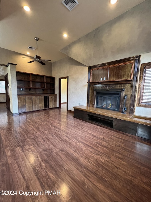 unfurnished living room featuring visible vents, a ceiling fan, wood finished floors, a fireplace, and recessed lighting