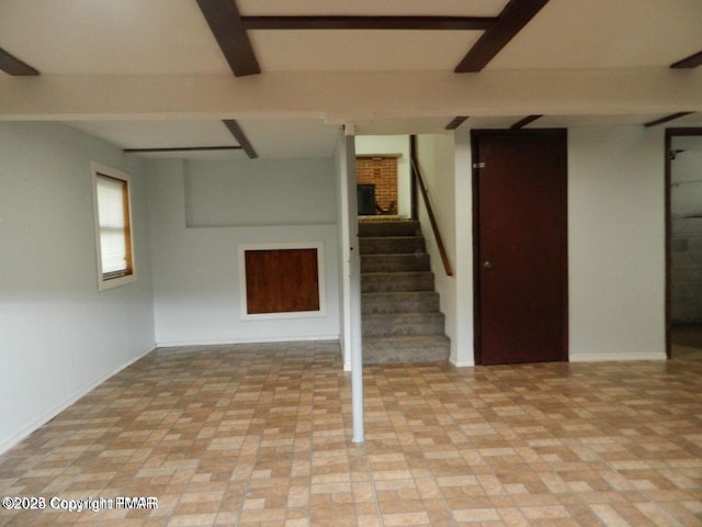 below grade area with brick floor and stairway