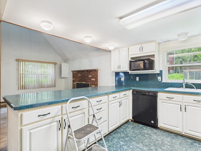 114 Oswayo Dr, Pocono Lake, PA 18347 - kitchen featuring black appliances, a sink, a peninsula, white cabinetry, and vaulted ceiling