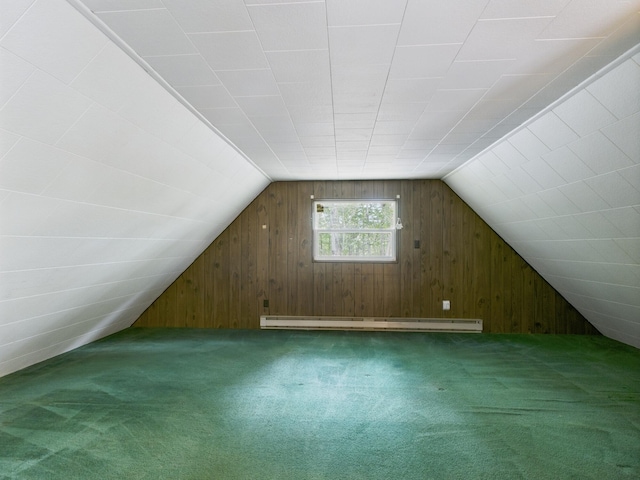 114 Oswayo Dr, Pocono Lake, PA 18347 - additional living space featuring carpet flooring, wooden walls, a baseboard radiator, and vaulted ceiling