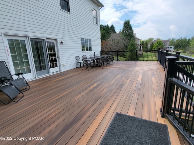 deck featuring outdoor dining space