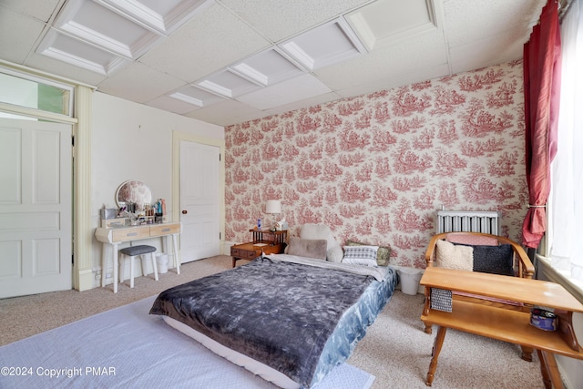 carpeted bedroom featuring wallpapered walls