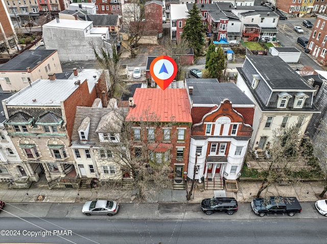 birds eye view of property with a residential view