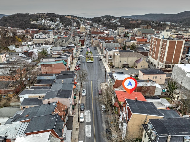 birds eye view of property featuring a mountain view