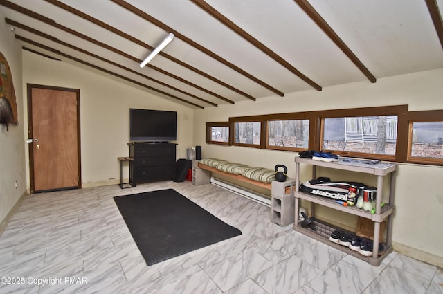 interior space featuring vaulted ceiling with beams and marble finish floor