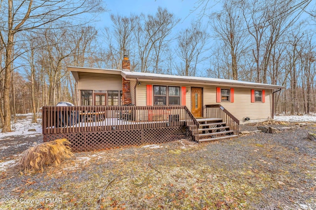 view of front of property featuring a chimney