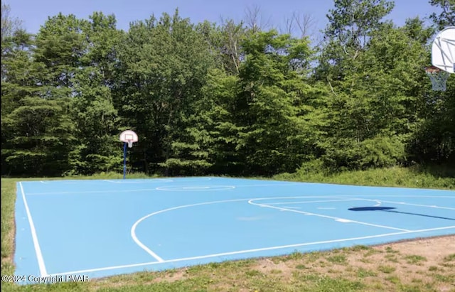 view of basketball court featuring community basketball court