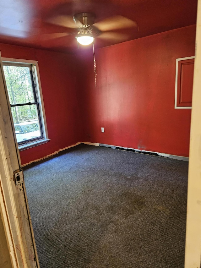 1405 Donalds Rd, Effort, PA 18330 - empty room featuring a ceiling fan, dark colored carpet, and baseboards
