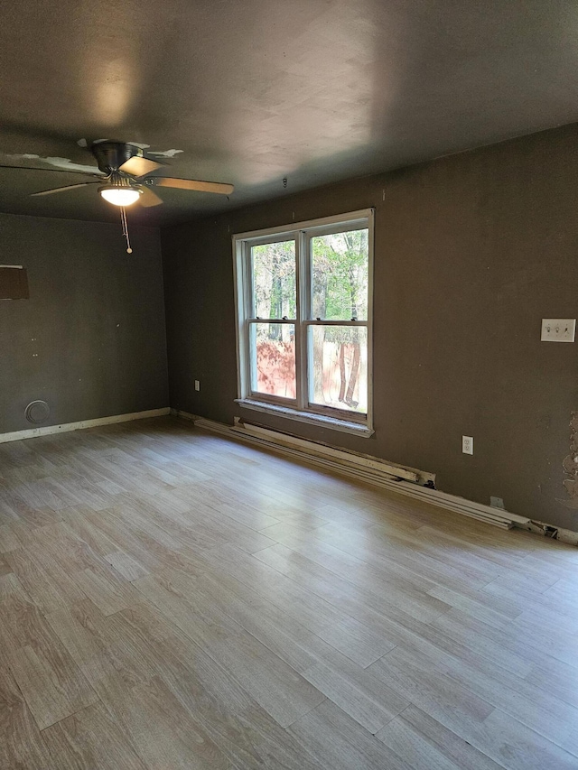 1405 Donalds Rd, Effort, PA 18330 - empty room featuring wood finished floors, a ceiling fan, and baseboards