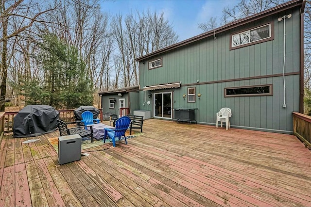 wooden deck with grilling area