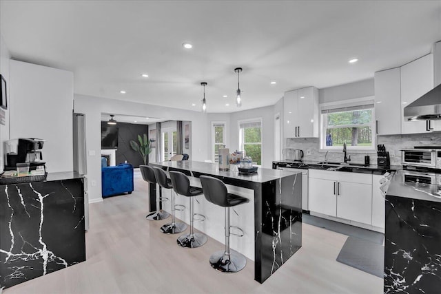 3336 Buck Run, Tobyhanna, PA 18466 - kitchen with modern cabinets, dark countertops, white cabinetry, dishwashing machine, and recessed lighting