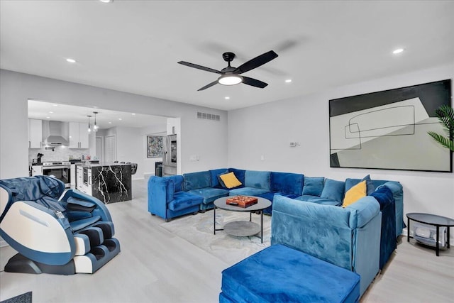 3336 Buck Run, Tobyhanna, PA 18466 - living room featuring light wood finished floors, ceiling fan, and recessed lighting
