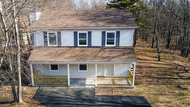 663 Sullivan Trl, Long Pond, PA 18334 - view of front facade featuring a porch and a shingled roof