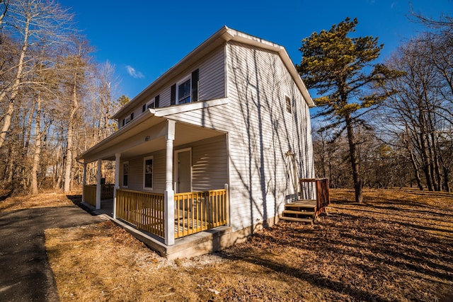 663 Sullivan Trl, Long Pond, PA 18334 - view of side of home with covered porch