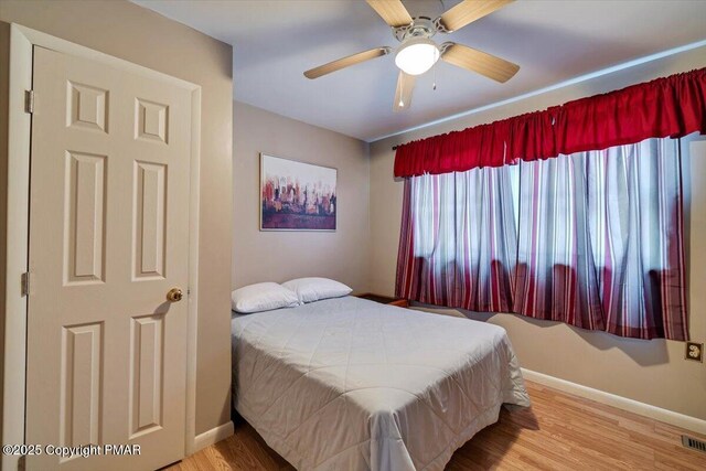 bathroom featuring vanity, toilet, and curtained shower