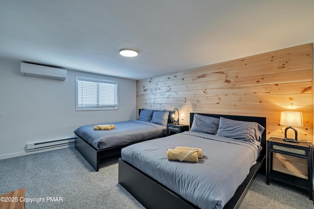 carpeted bedroom with a baseboard heating unit, wood walls, and a wall mounted AC