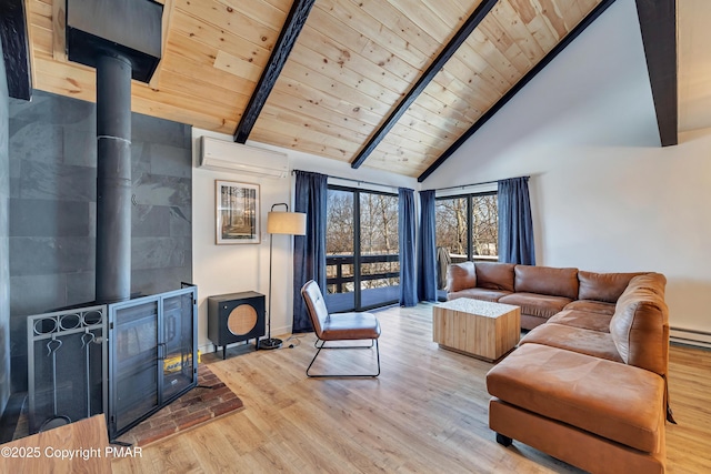 living area featuring wooden ceiling, a wall unit AC, wood finished floors, beamed ceiling, and a wood stove