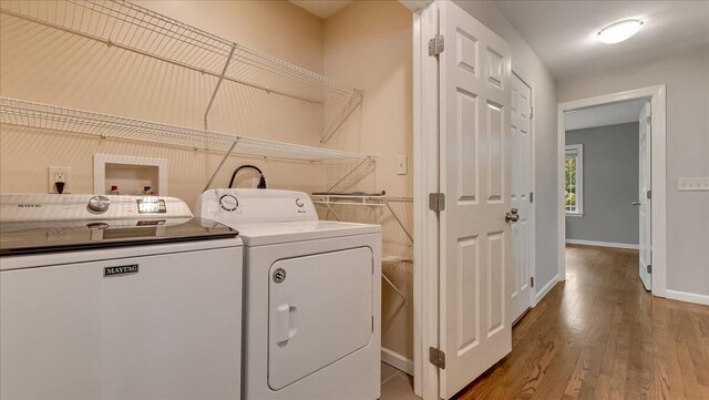 2705 W Gordon St, Allentown, PA 18104 - laundry area with washer and dryer and wood finished floors