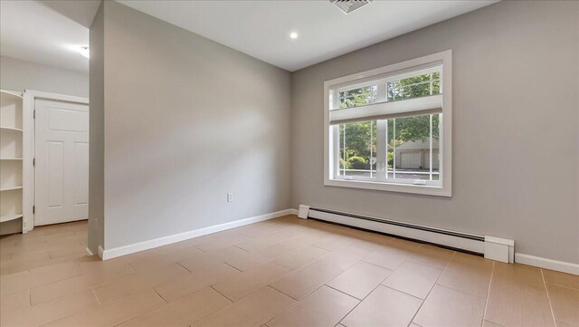 2705 W Gordon St, Allentown, PA 18104 - spare room featuring a baseboard radiator and recessed lighting