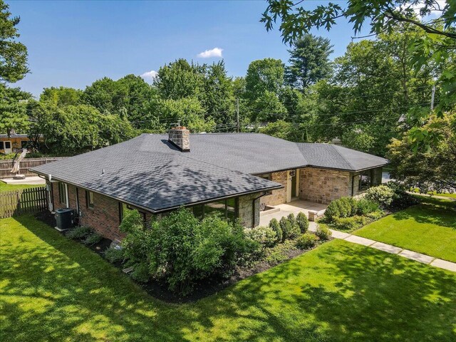 2705 W Gordon St, Allentown, PA 18104 - view of front of property with a chimney, roof with shingles, and brick siding