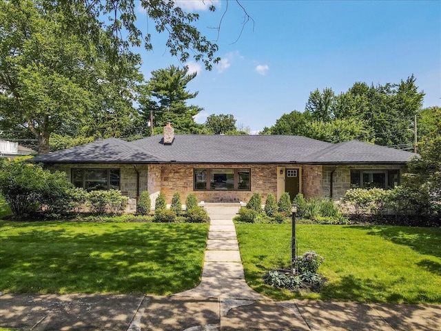 2705 W Gordon St, Allentown, PA 18104 - single story home with stone siding, a chimney, and a front lawn