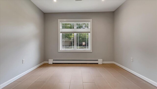 2705 W Gordon St, Allentown, PA 18104 - empty room with a baseboard radiator and baseboards