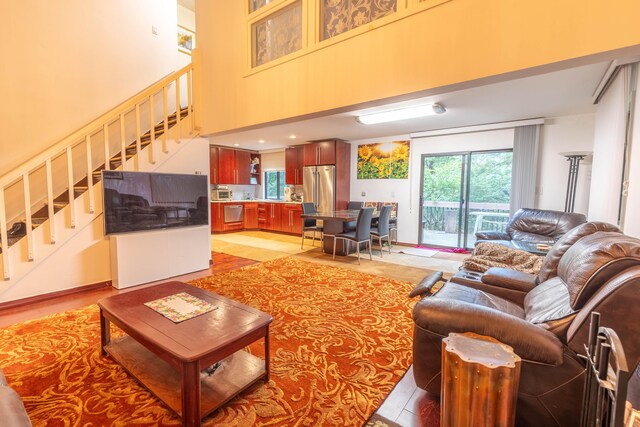 88 Wild Turkey Cir, Lake Ariel, PA 18436 - living area with stairway and a towering ceiling