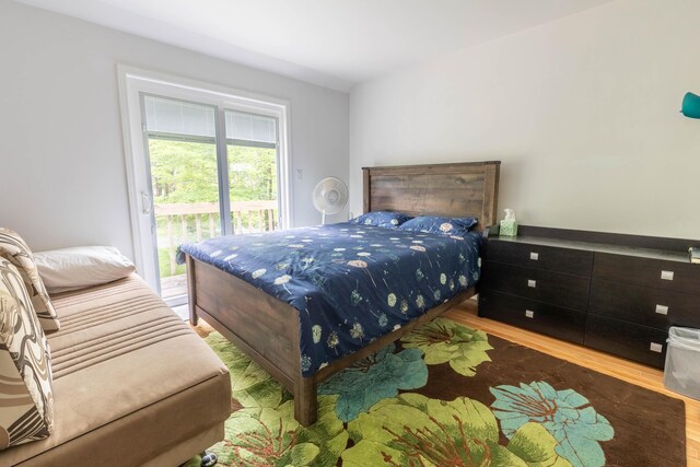 88 Wild Turkey Cir, Lake Ariel, PA 18436 - bedroom featuring access to outside and wood finished floors