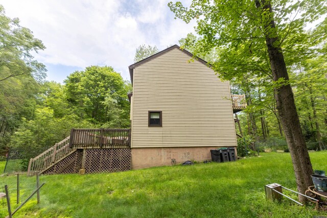 88 Wild Turkey Cir, Lake Ariel, PA 18436 - view of property exterior featuring a wooden deck, a yard, and stairs