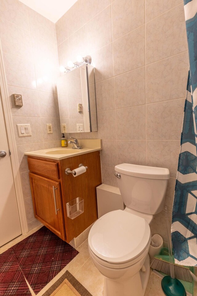 88 Wild Turkey Cir, Lake Ariel, PA 18436 - full bath featuring tile walls, vanity, a shower with shower curtain, and tile patterned floors