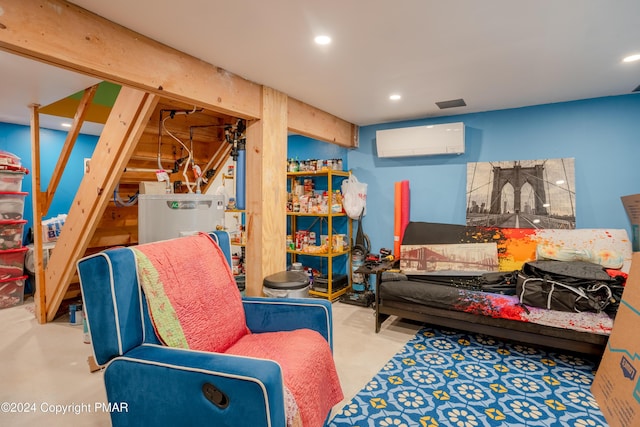 living area with stairway, gas water heater, an AC wall unit, and recessed lighting