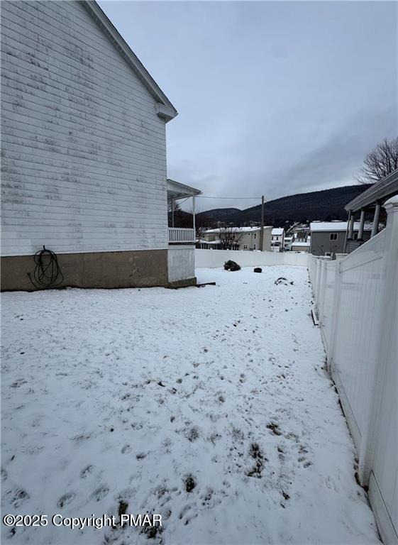 view of snowy yard