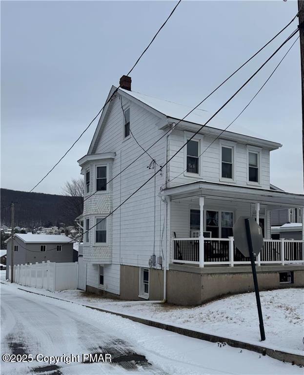 view of front of house with covered porch