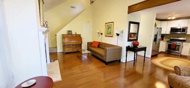 210 Dover Dr, Bushkill, PA 18324 - living area with wood finished floors and baseboards