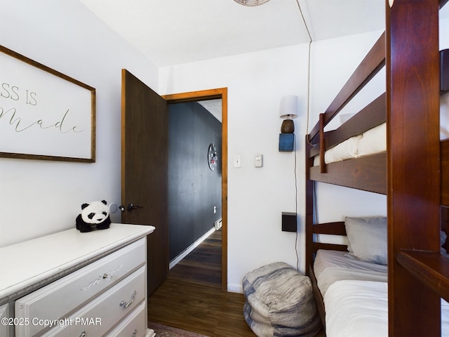 bedroom featuring dark wood-type flooring