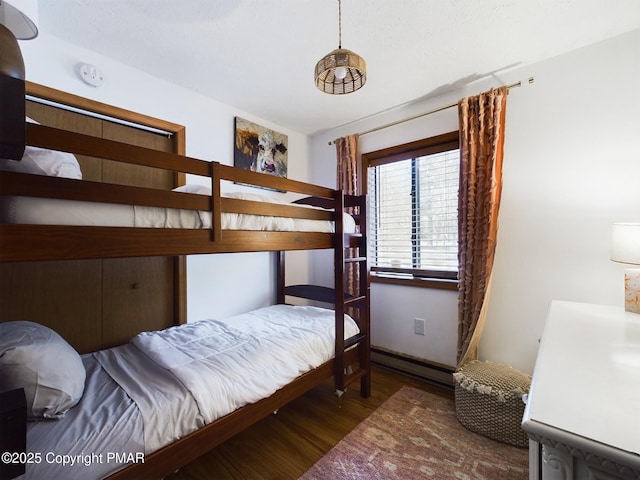 bedroom featuring dark hardwood / wood-style floors