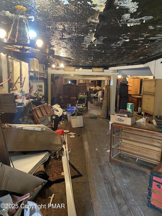 basement featuring wood-type flooring