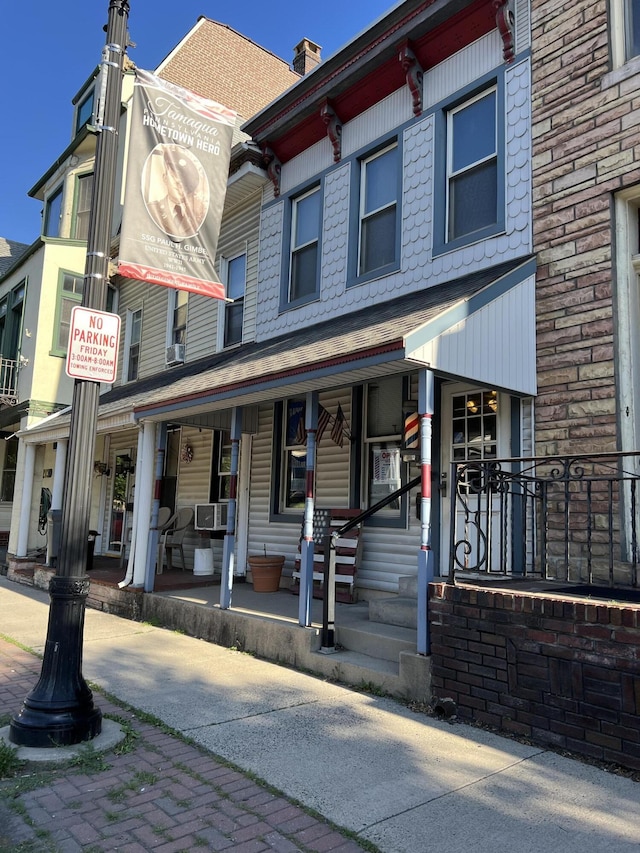 233 W Broad St, Tamaqua, PA 18252 - view of front of property featuring a porch and cooling unit