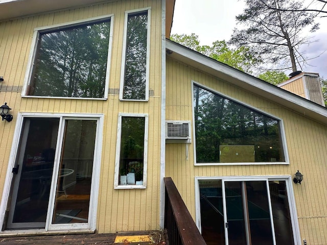 207 Manchester Dr, Bushkill, PA 18324 - view of property exterior featuring a chimney