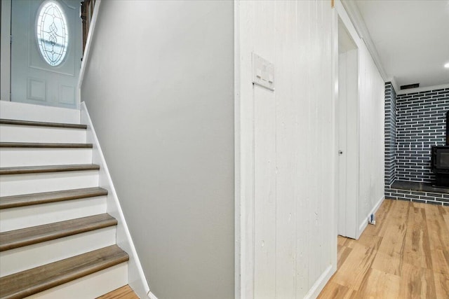 52 Bull Pine Rd, East Stroudsburg, PA 18301 - staircase featuring wood finished floors and a wood stove