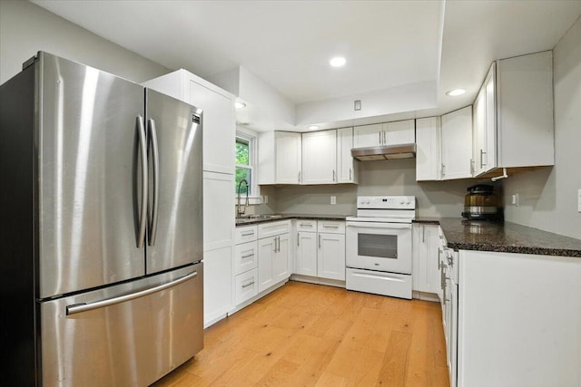 52 Bull Pine Rd, East Stroudsburg, PA 18301 - kitchen featuring freestanding refrigerator, white electric range oven, light wood finished floors, white cabinetry, and under cabinet range hood