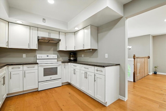 52 Bull Pine Rd, East Stroudsburg, PA 18301 - kitchen with white range with electric cooktop, under cabinet range hood, light wood-style flooring, recessed lighting, and white cabinets