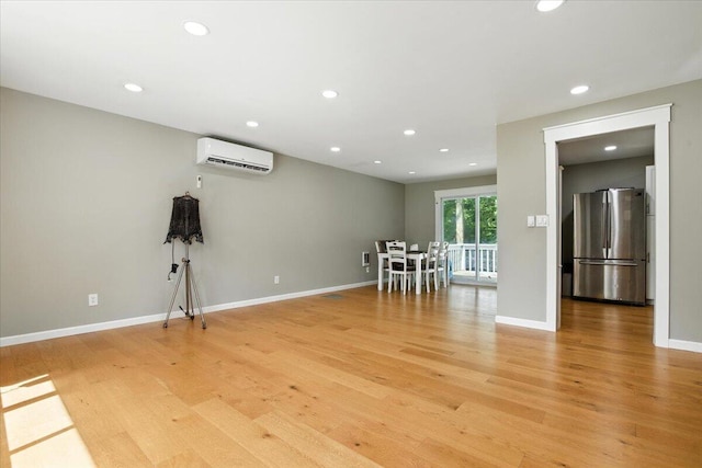 52 Bull Pine Rd, East Stroudsburg, PA 18301 - empty room featuring a wall mounted AC, light wood finished floors, and recessed lighting