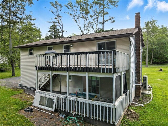 52 Bull Pine Rd, East Stroudsburg, PA 18301 - rear view of house featuring a deck, a chimney, a yard, and stairway
