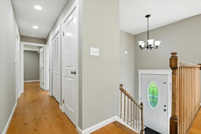 52 Bull Pine Rd, East Stroudsburg, PA 18301 - foyer entrance with light wood-style flooring, a chandelier, and recessed lighting
